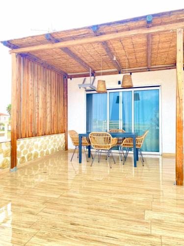 Messini House | Boho Natural Beachfront Detached House