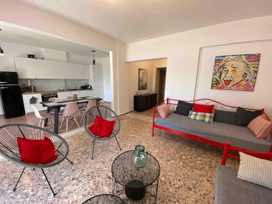 Lavreotiki Apartment | NEW! Flower Patio House 2 BDR - BBQ - Wash machine