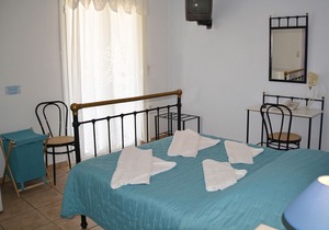 Room with double bed and panoramic seaview