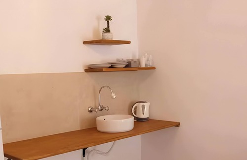 Kalymnos Town Apartment | Apartment 'Triple Room Pool View' with Mountain View, Wi-Fi and Air Conditioning