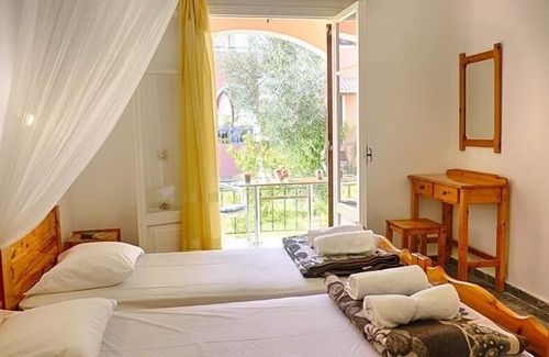 Agios Georgios Pagon Apartment | Dora Apartment 1 - in a quiet location only 300m from the sandy beach - in the bay of Agios Geo