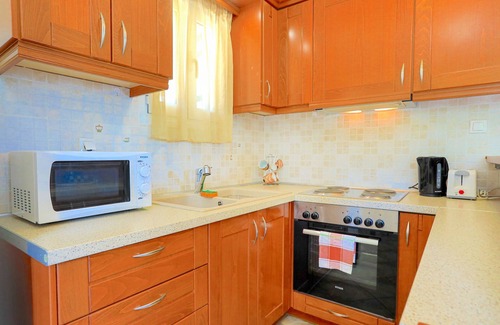 Agni Apartment | Katerina House: A comfortable village apartment, located just a few steps away from Kalami Beach
