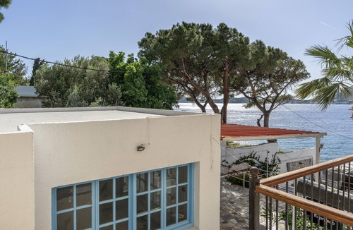 Massouri Apartment | Apartment 'Ermis Side Sea View' with Shared Garden, Wi-Fi and Air Conditioning