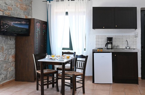 Karavostasi House | Aphrodite - traditional stone built studio apartment