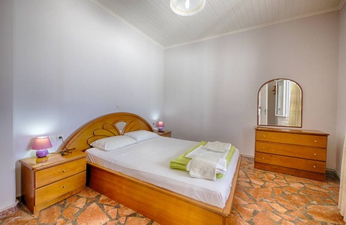 Agios Georgios Pagon Apartment | Arista Ferienwohnung 6 - mit Meerblick direkt am Strand von Agios Georgios Pagi