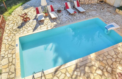 Xirokastello Villa | Charming stone villa, short drive to beach