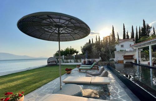 Dirfys-Messapia Villa | Evia Escape - Beachfront villa
