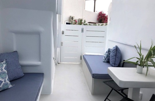 Platis Gialos Apartment | Mykonian Mews H1 Luxury Cave Suite with outdoor jacuzzi, lounge and cuisinette