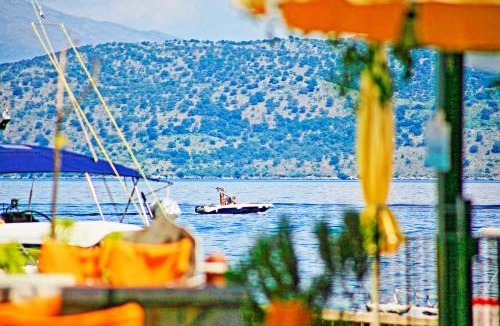 Agni Apartment | Olgas Cottage: Stone house on the beach