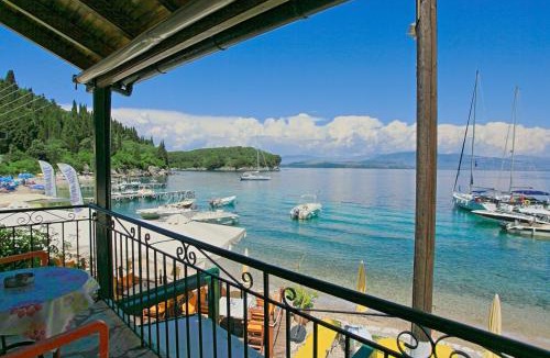 Agni Apartment | Olgas Cottage: Stone house on the beach