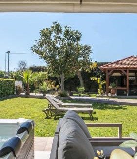 Petaloudes House | Sea Breeze & Nature villa ,near the sea, luxury jagguzi and spa private garden