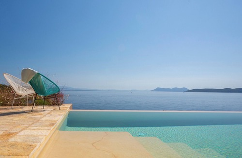 Evgiros Villa | Villa Arkoudaki: Luxurious 8-Bedroom Escape with Infinity Pool & Sea Access