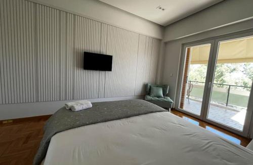 Voula Apartment | Voula's 2BR Escape Elegant and Stylish Living