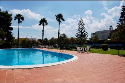 Villa Assunta - Elegante villino in residence con piscina