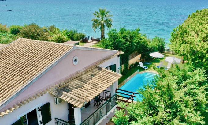 Agios Matthaios Villa | Beachfront Villa Rania with private pool
