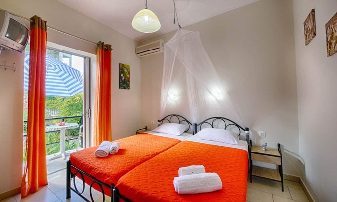 Agios Georgios Pagon Apartment | Kostas Studio 1 - the beach, small supermarkets and restaurants are within easy walking distance