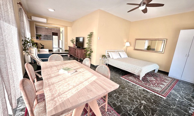 Olymbiaki Akti Apartment | Seaside Family Home with Wraparound Balcony & 2 Baths - Blue Zone Homes