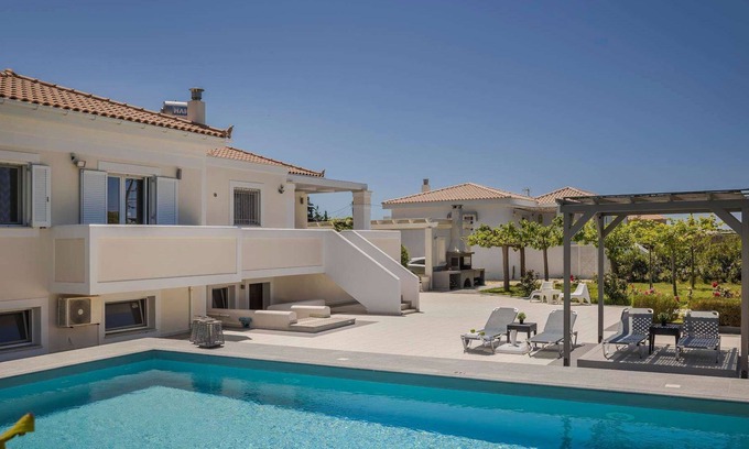 Svoronata Villa | Stylish Villa, A/C, Private Pool, Fabulous Location - Just 5mins walk to Tavernas & Ai Helis Beach!