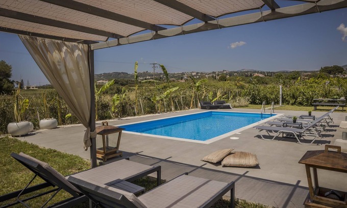 Svoronata Villa | Stylish Villa, A/C, Private Pool, Fabulous Location - Just 5mins walk to Tavernas & Ai Helis Beach!