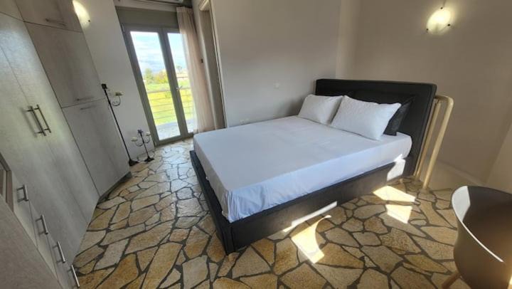 Photo of Bedroom in Aigialeia